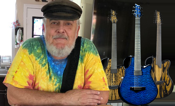 Musician George Hall with Emerald guitars