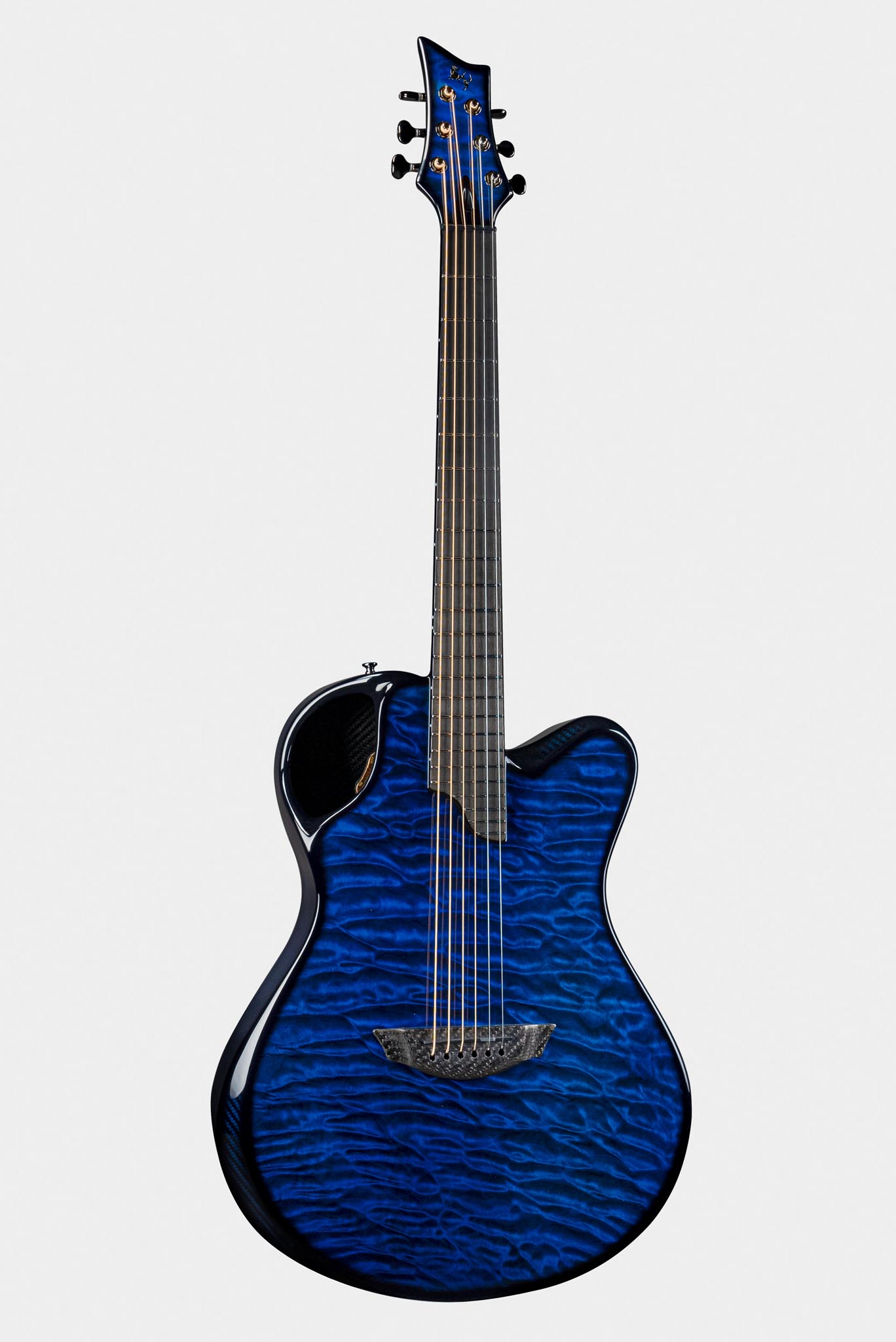Emerald Guitars X20 model featuring a vibrant blue Quilted Maple finish and black hardware