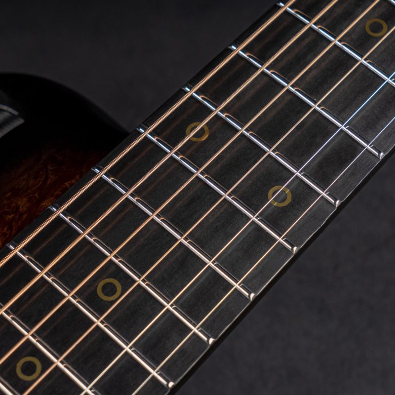 Close-up of Emerald guitar fretboard