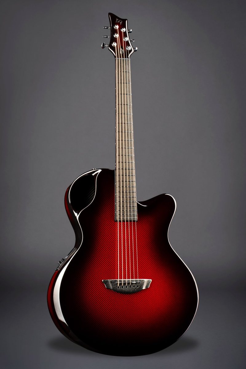 Emerald Guitars X30 model with a striking red to black burst finish, Carbon Fiber Weave, and integrated H-Hyve Pickup