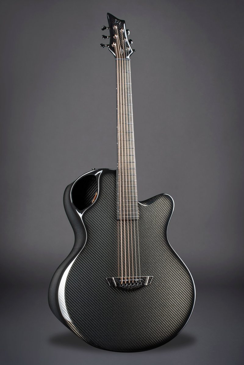 Full-length view of X30 Black model guitar with carbon fiber body