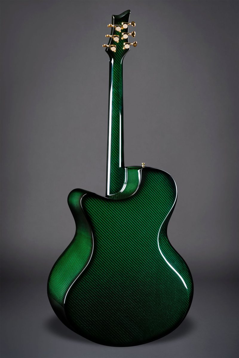 Full back view of Emerald X30 Royal Ebony guitar with green carbon weave finish