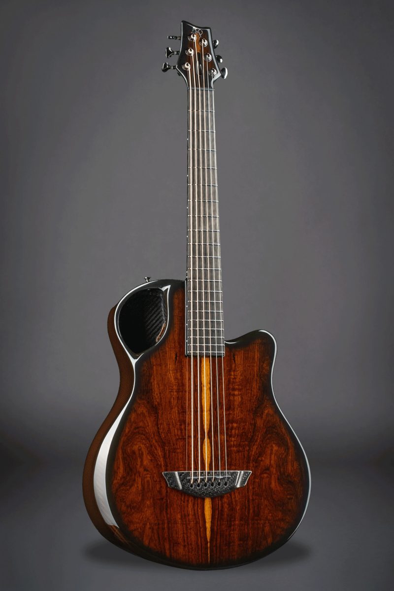 Emerald X7 Cocobolo Amber guitar against grey background