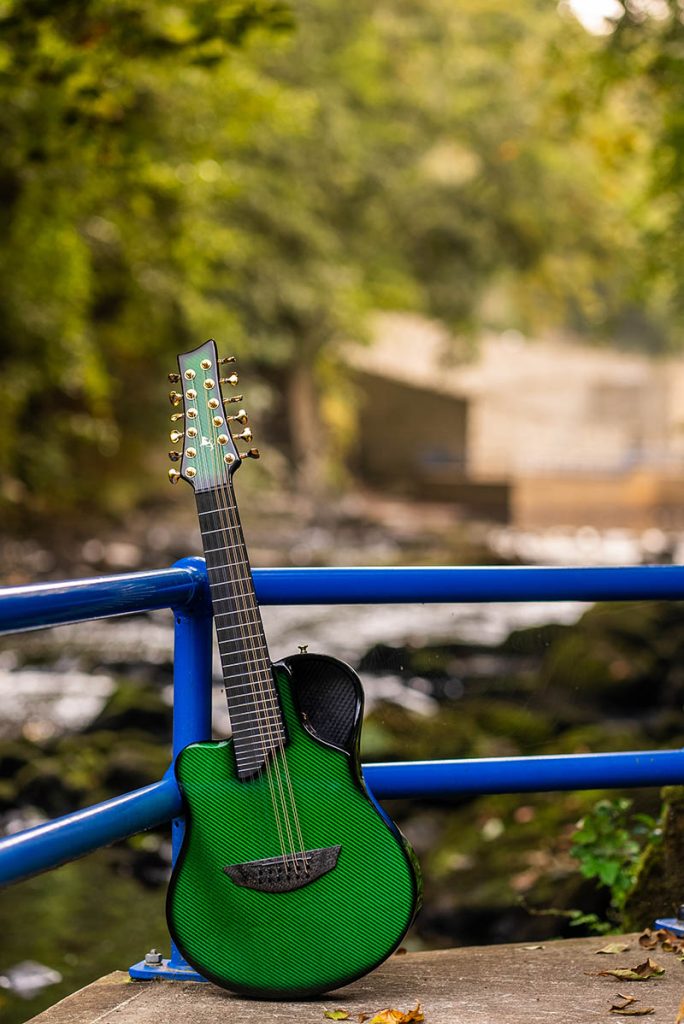 Emerald Green Amicus Guitar along the river