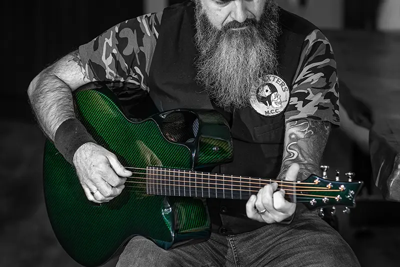 davy k with a emerald guitars x30