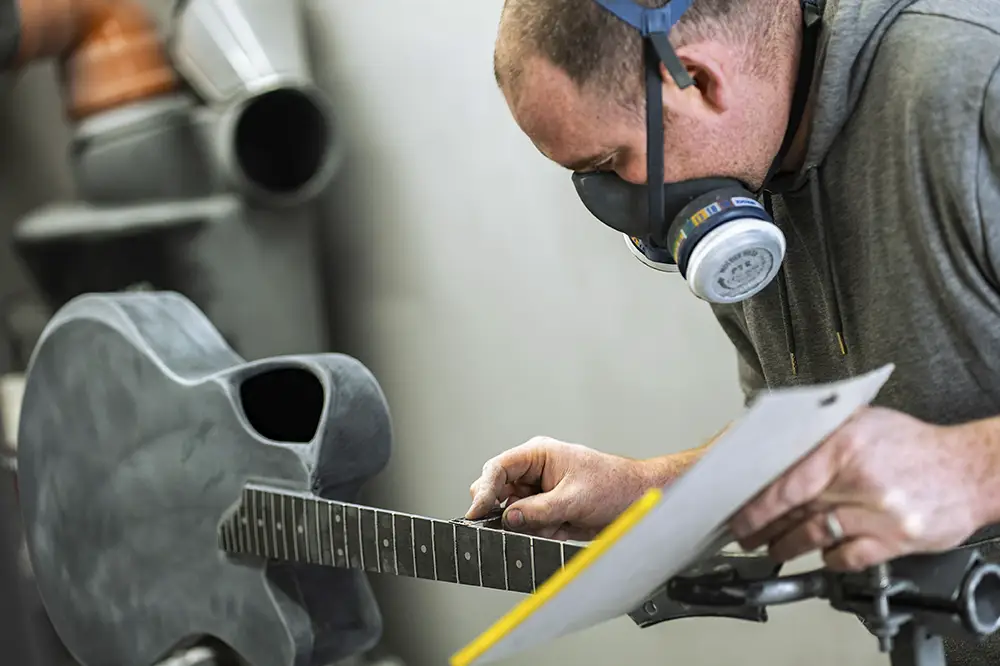 Emerald guitars carbon fiber fret process